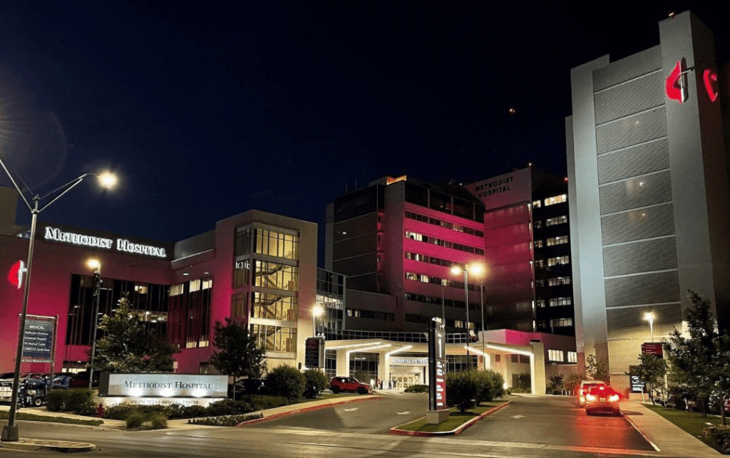 Methodist Hospital San Antonio - Texas Hospital Association Methodist Hospital San Antonio with maroon and white exterior lights to honor Robb Elementary.