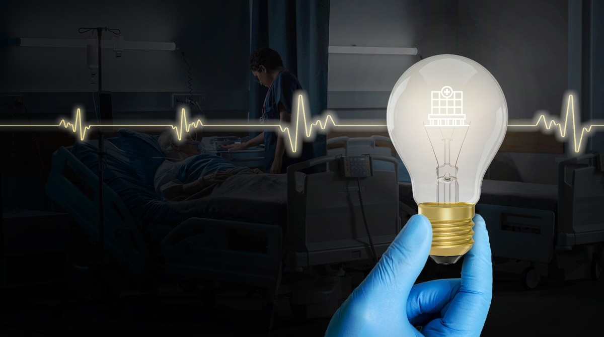 Gloved hand holding a glowing light bulb in front of a hospital ICU scene with a patient and a heartbeat line across the image.