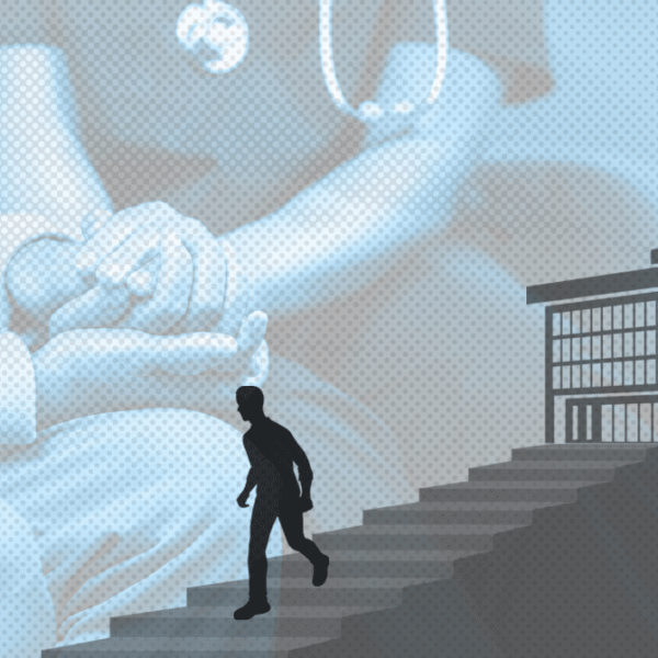 Silhouette of a person walking up stairs toward a hospital building with oversized medical imagery in the background.