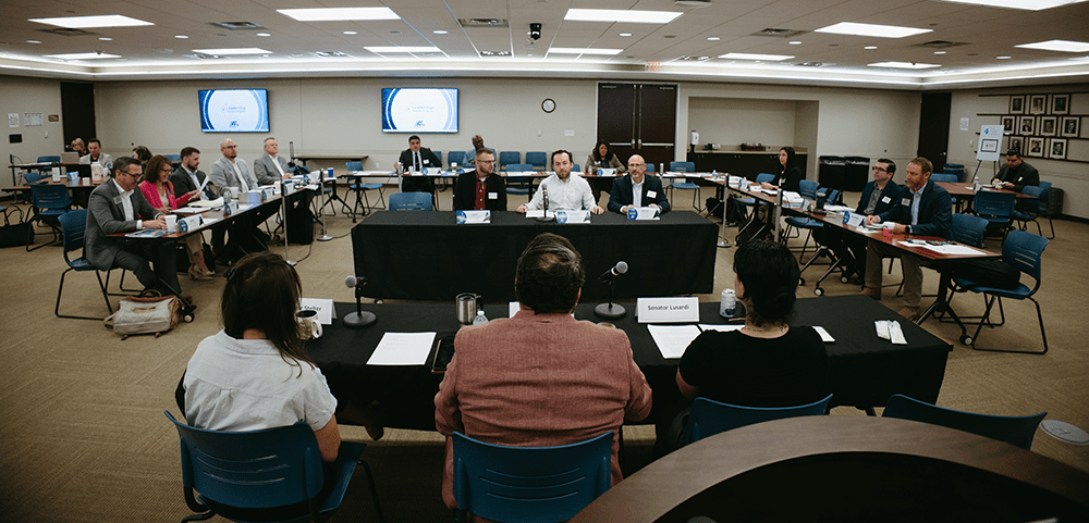 Antonio Cardenas (center) participates in a mock testimony session during THA's Leadership Fellows program. - Texas Hospital Association Antonio Cardenas (center) participates in a mock testimony session during THA's Leadership Fellows program.