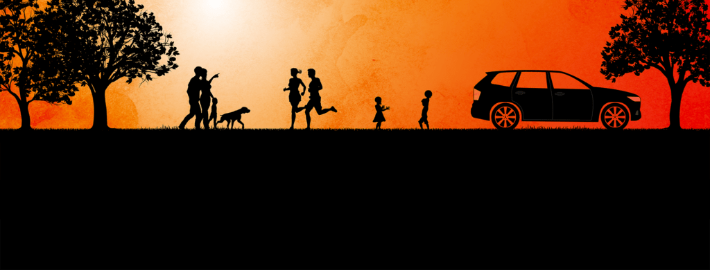Silhouetted family walking with a dog and a parked SUV against a warm orange sunset.
