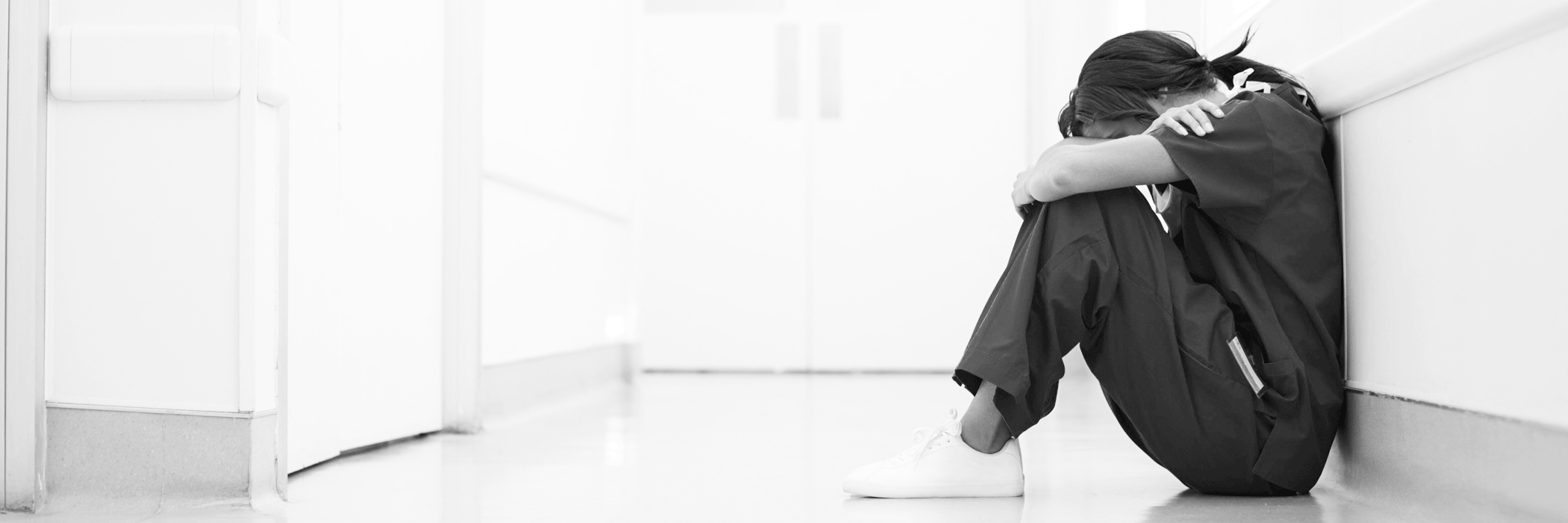 tired-nurse-on-floor - Texas Hospital Association