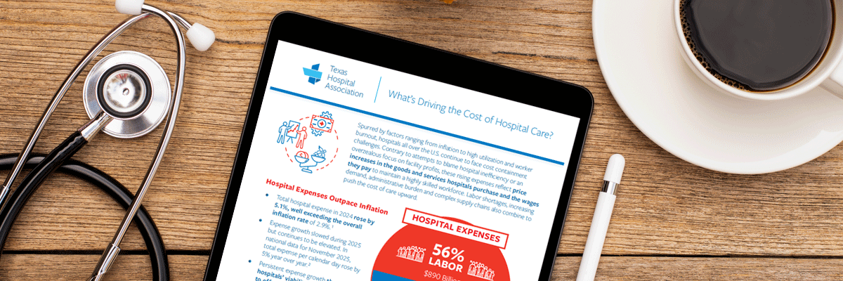 Tablet displaying a hospital cost infographic on a wooden desk, with a stethoscope and a cup of coffee nearby.