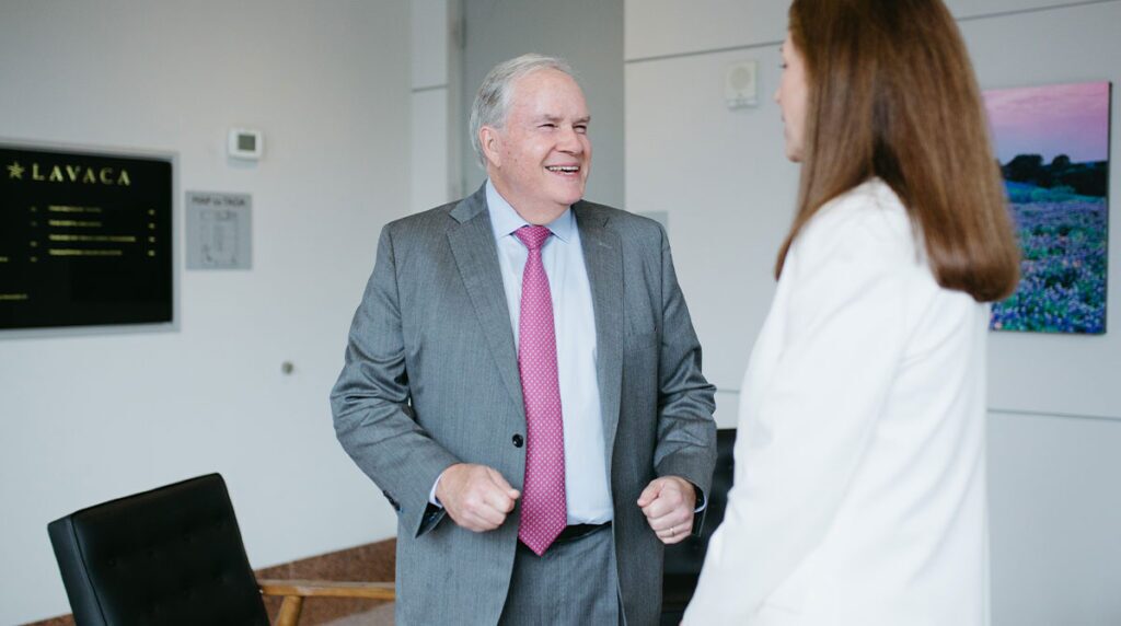 CEO Messages - Texas Hospital Association Texas Hospital Association CEO/President John Hawkins stands in the association lobby, greeting a member CEO.