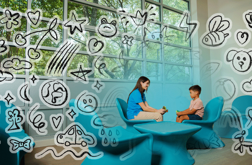Woman and child talk in a bright blue seating area, doodles on glass walls convey a playful, welcoming space